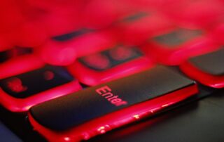 a close up of a red and black keyboard